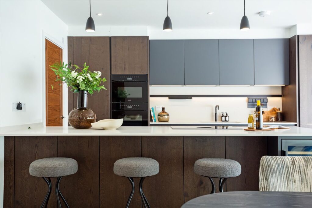Luxury bespoke handleless kitchen in a contemporary new build designed for modern living in Wimbledon, London